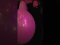 Girl Blow To Pop Balloon At Club