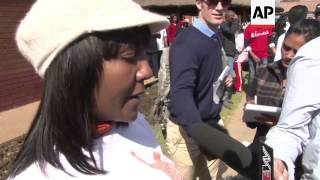 Family arrive at hospital on Mandela's birthday, grandchildren do community service