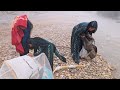 Iranian women being caught with a six-month-old baby in the most severe storm and hail