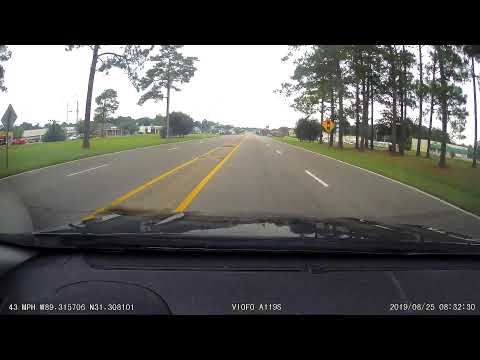 Old person on the wrong side of the highway & cloverleaf