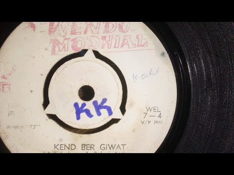 KEND BER GIWAT.JOHN AMBOGO & RAFAEL ANDWATA. OKOK RACHAR BAND. WENDO MODHIAL 04 SIDE A 1977