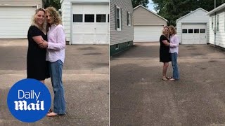 Heart-warming moment long lost sisters embrace after being reunited