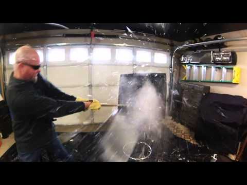 Breaking a TV with a Sledgehammer, in slow motion.