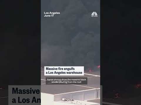 Massive fire engulfs a Los Angeles warehouse