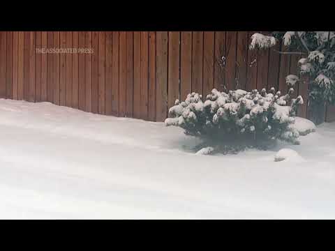 Winter storm dumps snow on Denver area