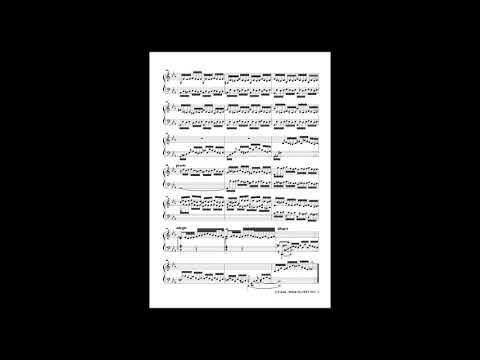 Guy Renardeau plays J.S. Bach Prelude & Fuga c minor with sheet music.