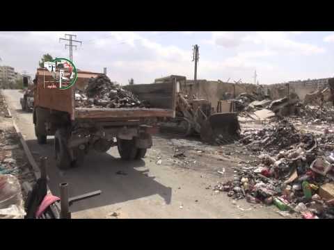 تقرير عن ترحيل القمامة من مكب جسر الحج من قبل شعبة النظافة في المجلس المحلي لمدينة حلب في محافظة حلب