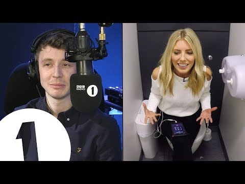Mollie King tries to impress Radio 1 bosses... by presenting from their toilet