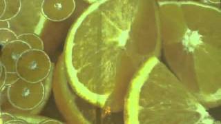 Interactive Projection System in Shopping Mall. Orange Slice Reveal Effect.