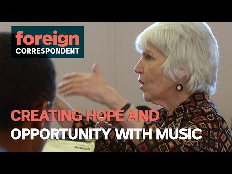 This Teacher is creating hope and opportunity through Music (2014) | Foreign Correspondent