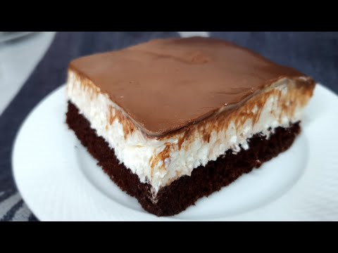 Cocoa sponge cake with mascarpone whipped cream and milk chocolate ganache