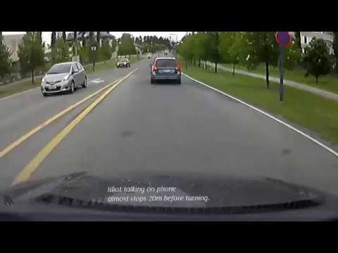 Finnish idiot driver talking on cell phone and almost stops the front of me.