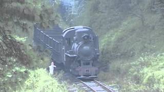 preview picture of video 'Chinese steam - Shibanxi, C2 with empty coal train rounds Jaoba horseshoe curve'
