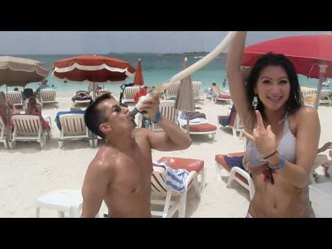 Beer bonging on the beaches of St. Maarten