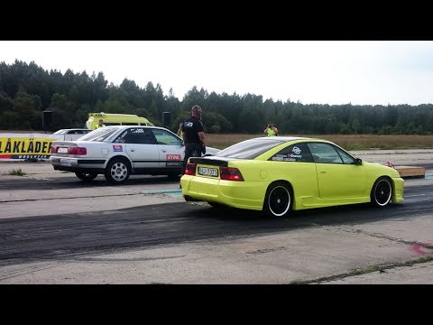 Audi S4 Quattro 2.2t 20v vs Opel Calibra 4x4 2.0 Turbo 1/4 mile drag race