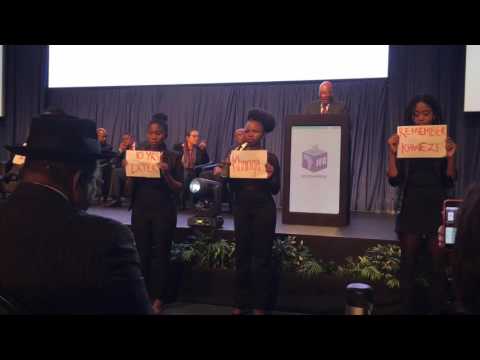 Four women stage a silent protest during president Jacob Zuma's speech at the ROC