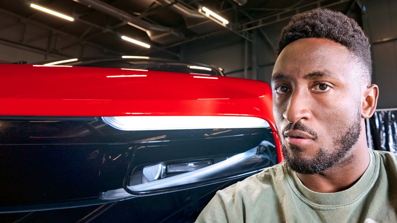 Camouflaged Ferrari Luce electric prototype driving on a private test track