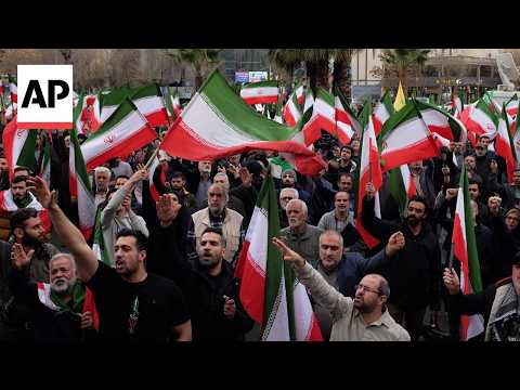 Supporters of Iran's government protest against Israel and US strikes