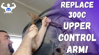 how to replace upper control arm chrysler 300