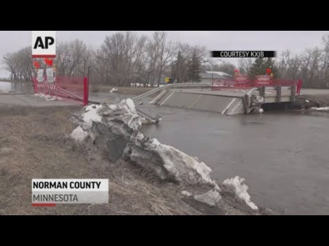 An ice jam led to a bridge collapsing in Norman County, Minnesota on Tuesday morning. Flooding in the area also shut down several roads. (April 10)