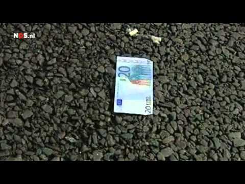 Money over highway A2 Netherlands A money transport truck this morning on the A2 in Beek lost a box of money