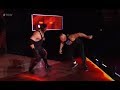 Kane throws Brock Lesnar off the stage