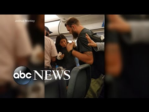 , title : '2 families outraged after incident with service dog on flight'