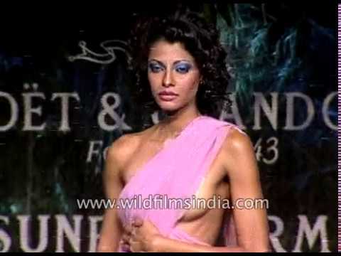 Indian women model sarees and designerwear at a Suneet Verma fashion show
