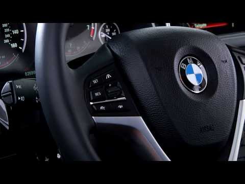 Part of a video titled Cruise Control Buttons | BMW Genius How-To - YouTube