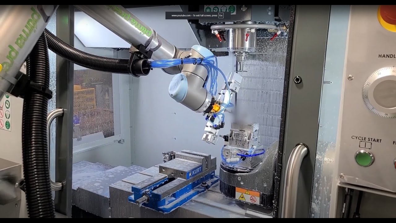 Universal Robot UR10 tending two 5-axis Haas VF2SS CNCs  | Optima Precision