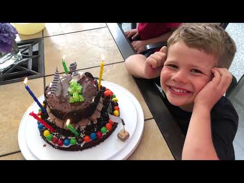 Seth sees his cake for the first time.