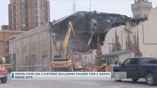 Download the video "Demolition On 2 Historic Buildings Paused For 2 Weeks"