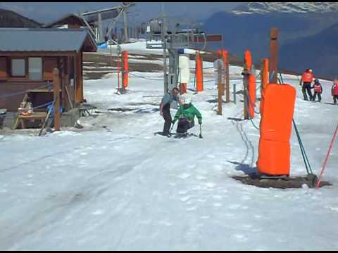 Adaptive skiing - getting on a drag lift in mono-ski demo