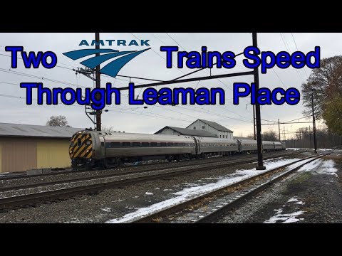 Two Amtrak Trains Speed Through Leaman Place On The Keystone Corridor