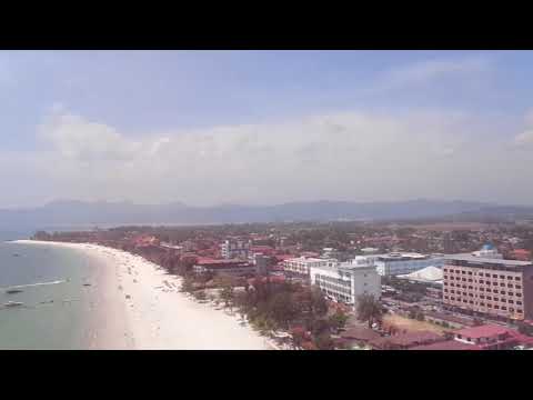 Look at guys  Parasailing fly at sky at cenang Beach 🏖