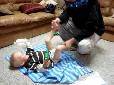 How to change a diaper to a 2 month old baby boy. ▶6:45