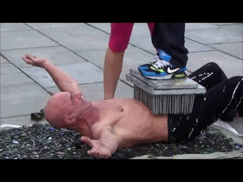 Amazing Fakir and Acrobat Street Performer. Turin, Italy