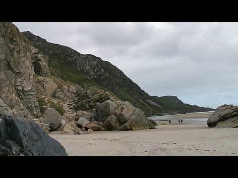 Exploring the caves of Maghera beach, Donegal