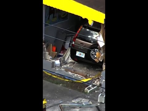 Five hospitalized after car crashes into daycare