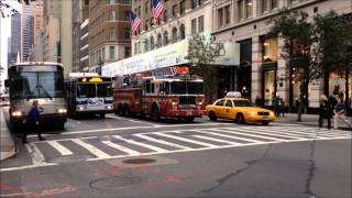 preview picture of video 'FDNY LADDER 24 CRUISING BY E. 40TH ST. & 5TH AVE. IN THE MIDTOWN AREA OF MANHATTAN IN NEW YORK CITY.'