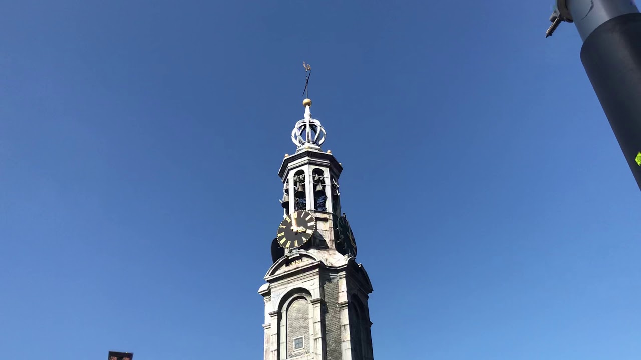 Experience the enchanting symphony of Munttoren's melodious carillon bells.