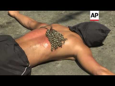 Filipinos mark Maundy Thursday with flagellation Video