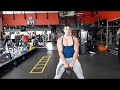 Young Bodybuilder fitness workout. Kettle ball, big arms, biceps, shoulder muscles