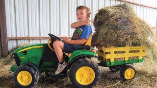 Using tractors to get hay out of the barn before storm comes | Tractors for kids