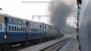 preview picture of video 'Heavy Smoking KZJ WDG3A Twins Headed Vishaka Fills Moulaali Railway Station With Smoke.'