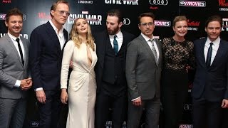 Chris Evans Can't Keep His Eyes Off Elizabeth Olsen's Chest at 'Captain America: Civil War' Premi…