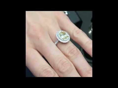 2.22 ct Oval Yellow Diamond Engagement Ring in Double Halo