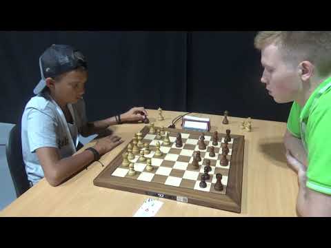 GM Paulius Pultinevicius against chess kid