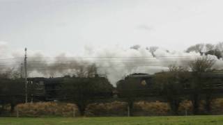 preview picture of video '44871 and 45407 leaving Carnforth - 30 December 2009'