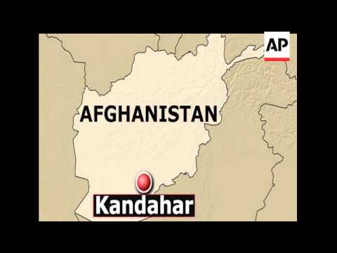 A U.S. service member walked out of his base in southern Afghanistan before dawn Sunday and started